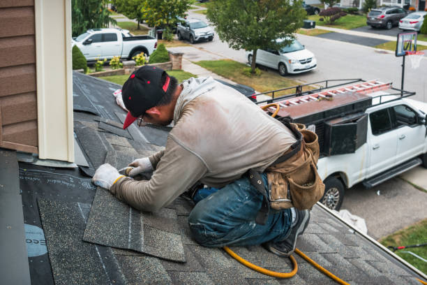 Professional Flat Roof Repair technician working in Welches, OR